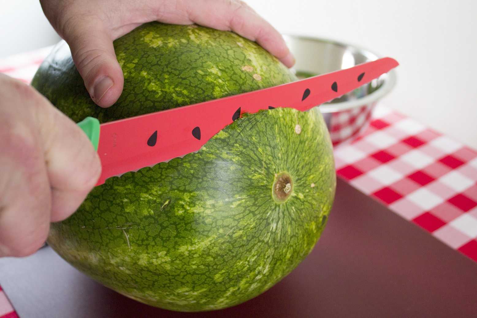cutting top off watermelon