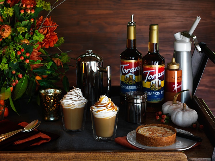 small coffee bar with a bottle of gingerbread syrup and pumpkin pie syrup