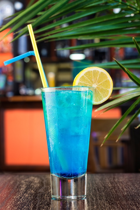 Blue Raspberry Lemonade with straw and lemon