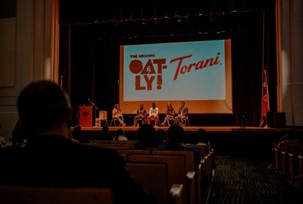 Oatly and Torani sponsors on projector screen
