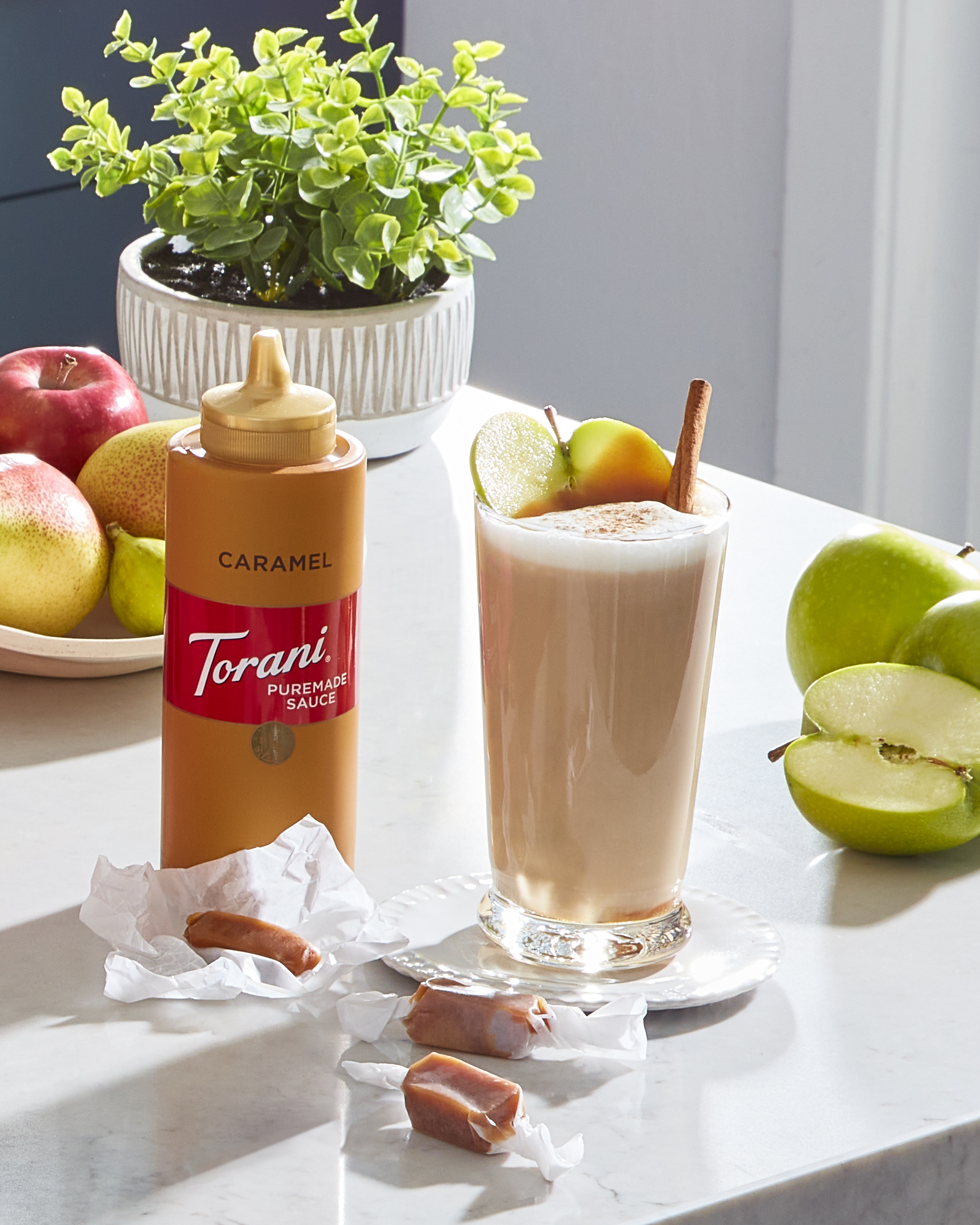 torani caramel syrup bottle image with caramel apple latte on table/></p>

<p><strong>INGREDIENTS</strong></p>

<p>1 Tbsp (1/2 oz) Torani Puremade Caramel Sauce</p>

<p>1 Tbsp (1/2 oz) Torani Puremade Green Apple Syrup</p>

<p>1 cup (8 oz) milk</p>

<p>1/2 cup (4 oz) strong brewed coffee or 2 shots of espresso</p>

<h4>INSTRUCTIONS:</h4>

<p>Steam together milk and Torani. Pour into a tall glass and add coffee. Garnish with Caramel and green apple slices</p>

<hr />
<p><strong>The Black & White Frappe</strong></p>

<p>In many delis in New York’s Manhattan, you’ll find the iconic Black and White Cookie. While we can’t pretend this drink will give you the full texture of that cookie experience, it will give you the right flavor - a beautiful mix of chocolate and vanilla. The espresso adds an additional pop to the drink that will leave you smiling for the rest of the day. At least that’s what happened to us. </p>

<p><img src=